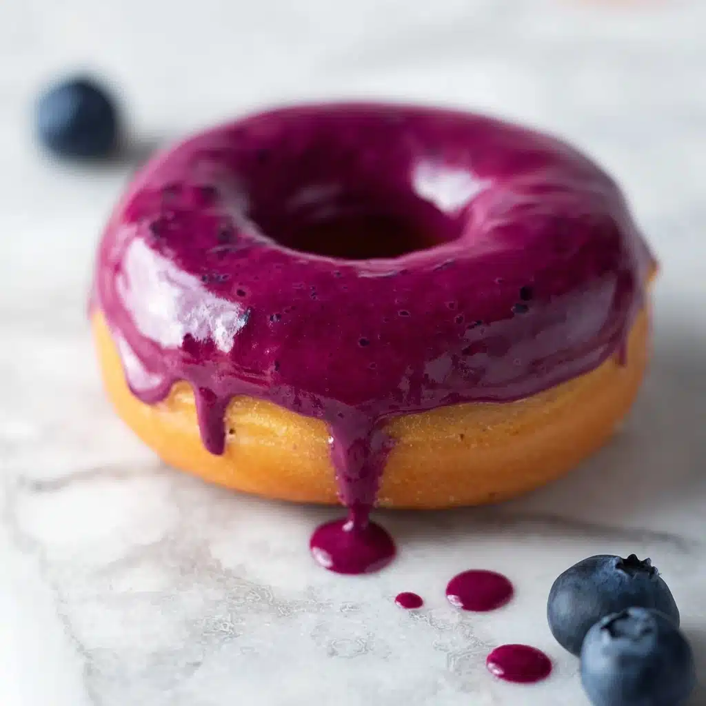 Vanilla Bean Cake Donuts with Blueberry Glaze Recipe - Recipe Image