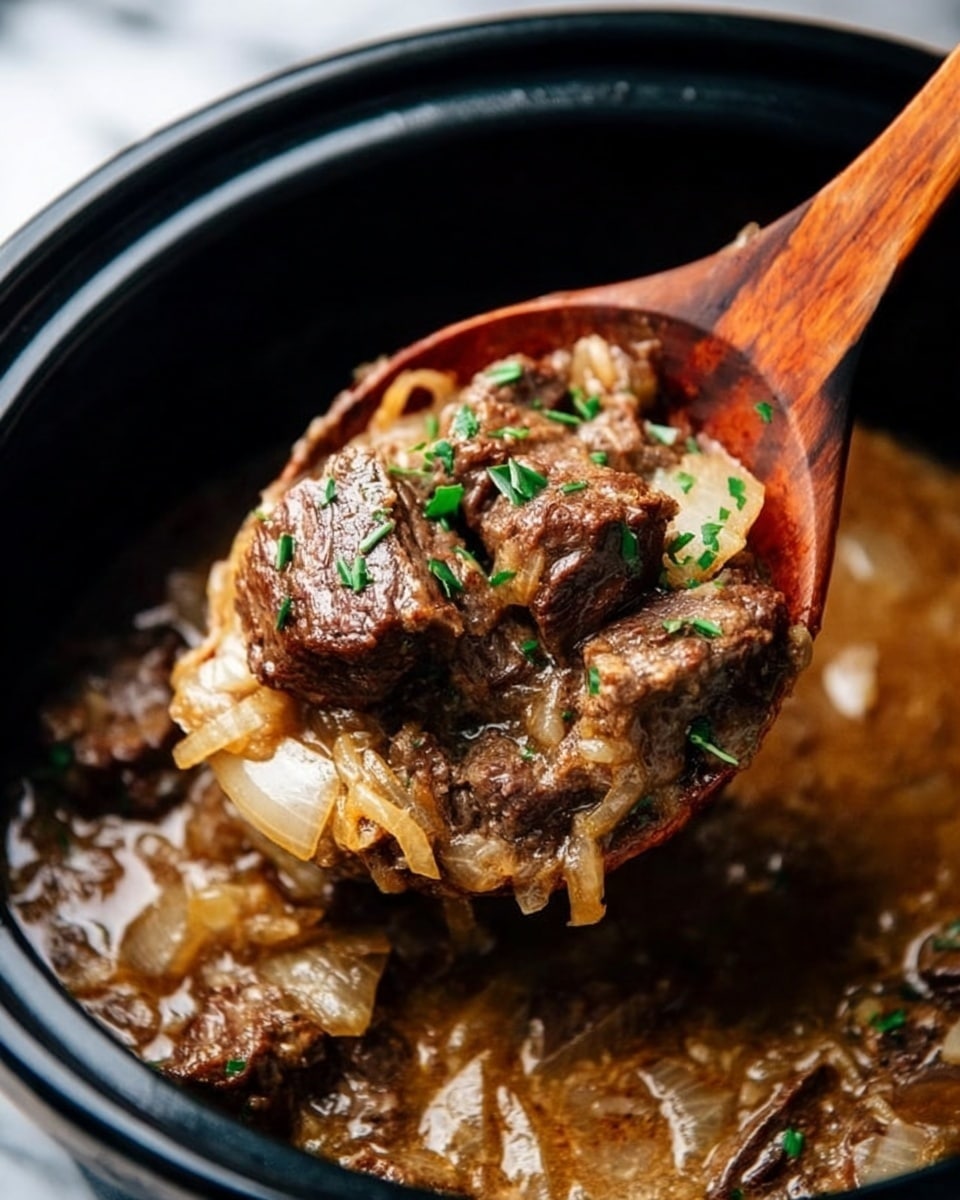 The image shows a close-up of a thick stew inside a black pot, with chunks of browned beef, translucent cooked onions, and a light brown sauce that looks rich and flavorful. A wooden spoon lifts a portion of the stew, fully loaded with beef pieces and onions, with small green herb sprinkles on top adding a fresh touch. The scene focuses on the texture of the meat, the softness of the onions, and the glossy, slightly thick sauce surrounding them. The pot sits on a white marbled surface. Photo taken with an iphone --ar 4:5 --v 7