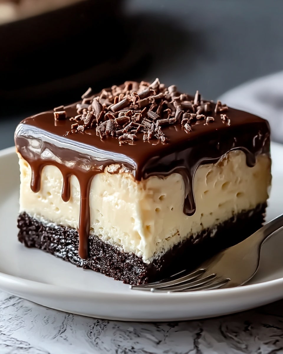 A three-layer dessert piece on a white plate sits on a white marbled surface; the bottom layer is dark, moist chocolate cake, soaked with glossy dark chocolate sauce pooling around it; the middle layer is a thick, pale yellow creamy custard with a smooth texture dripping slightly down the sides; the top layer is a shiny, rich chocolate glaze sprinkled with small dark chocolate curls; a silver fork rests beside the dessert. photo taken with an iphone --ar 4:5 --v 7